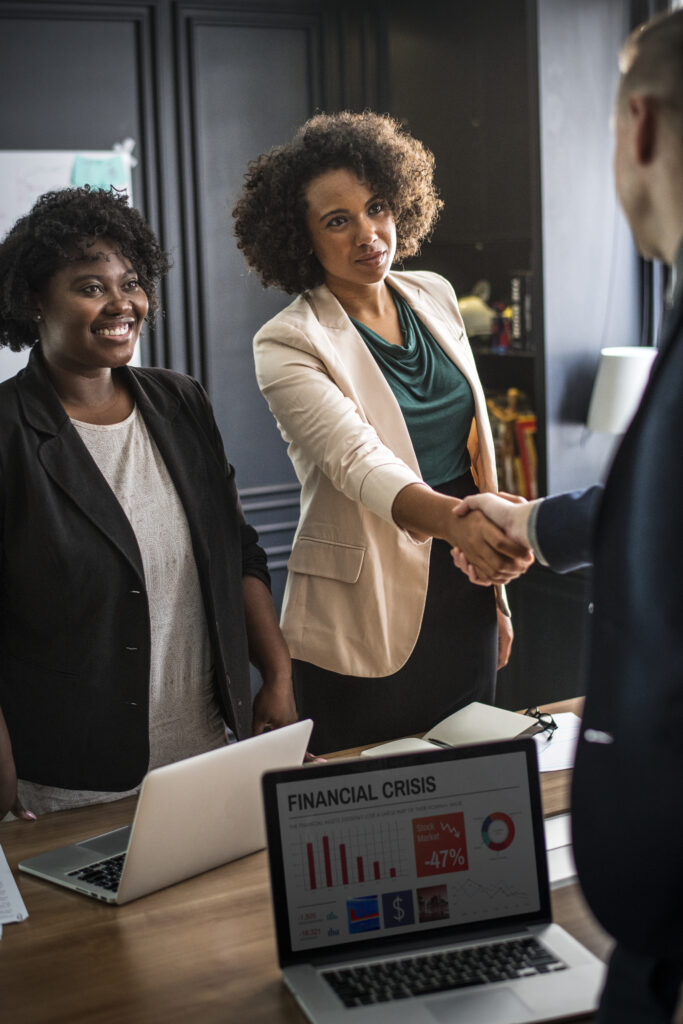 business partners shaking hands agreement